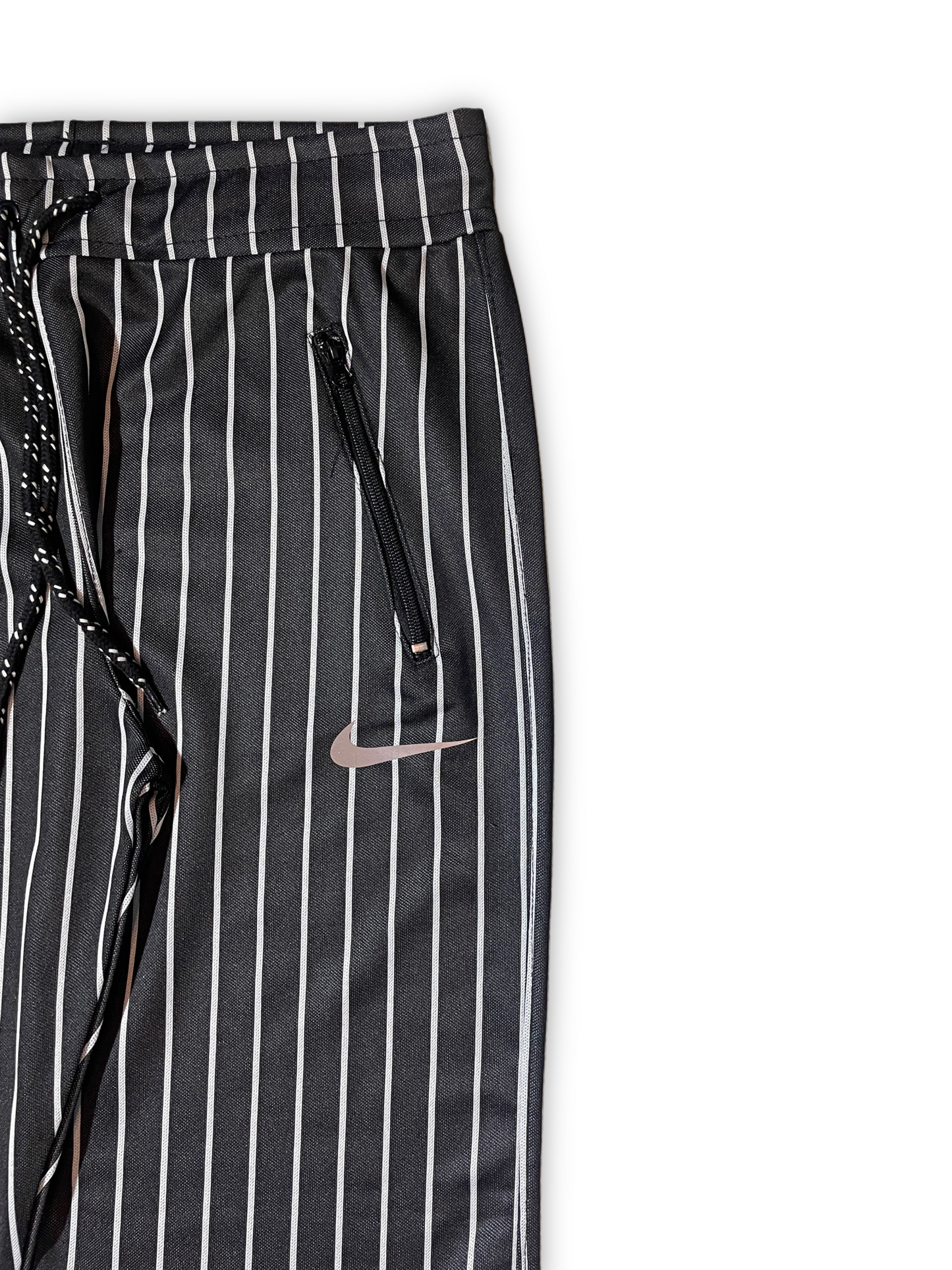 Black and White Striped Pants with Nike Swoosh Logo